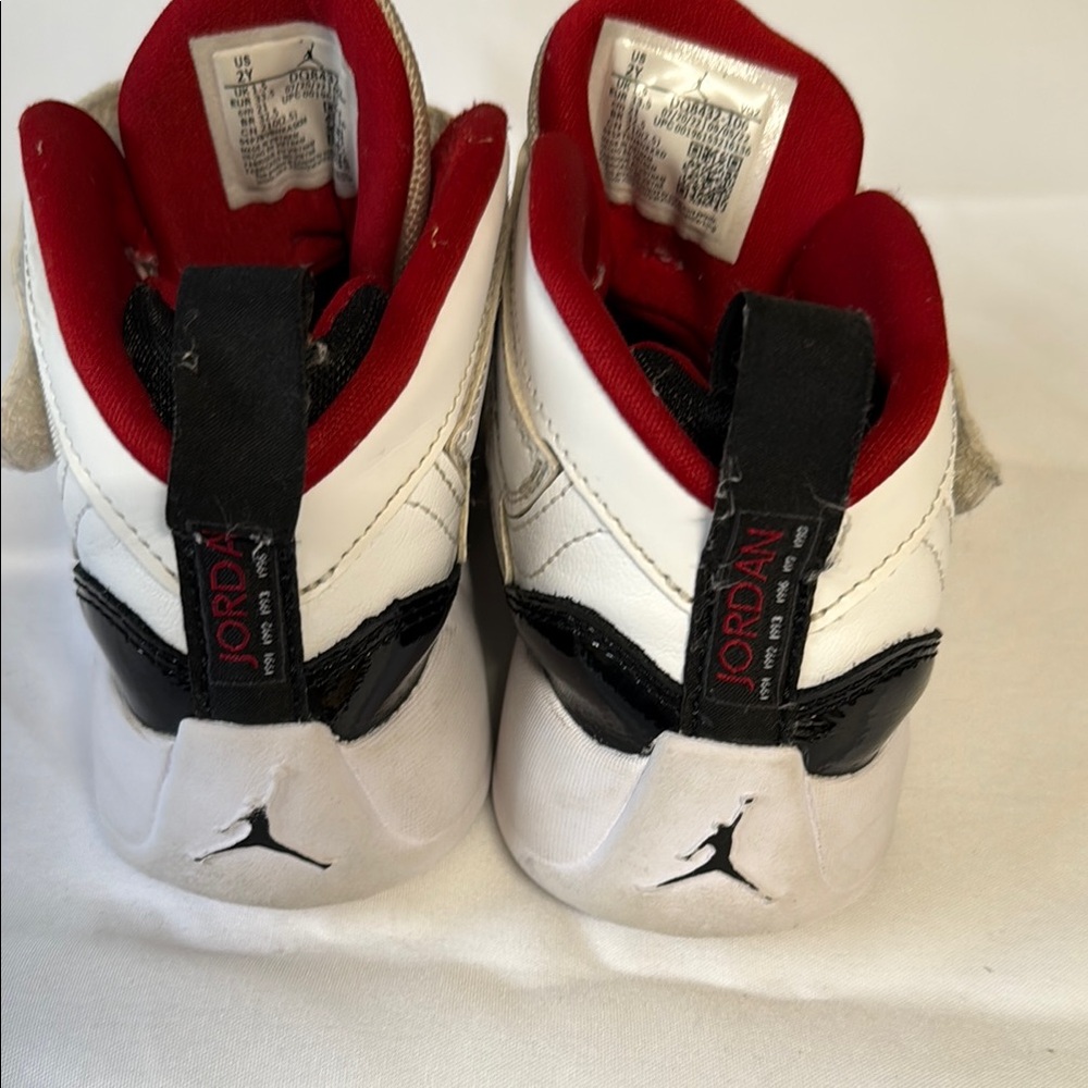 Jordan Kids' White, Black, and Red Sneakers